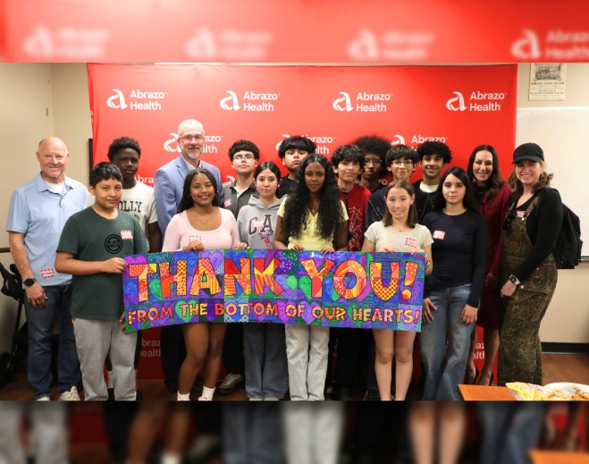 Students at Maryland School holding a thank you sign