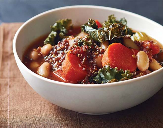 Bowl of vegetable soup with quinoa