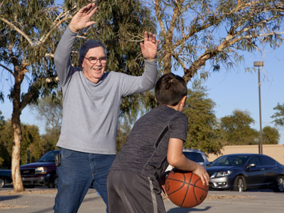 Ray Bornert and Grandson Playing Basketball