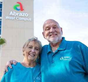 Don Miller and wife in front of Abrazo West